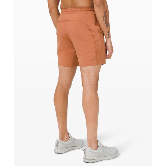 LULULEMON Men's Pace Breaker 7 inch Orangey Brown (desert sun) LINED Size Small - Picture 1 of 8